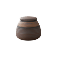 Bodhi mini urn, bruin met horizontale strepen en een lichtere band, ronde vorm