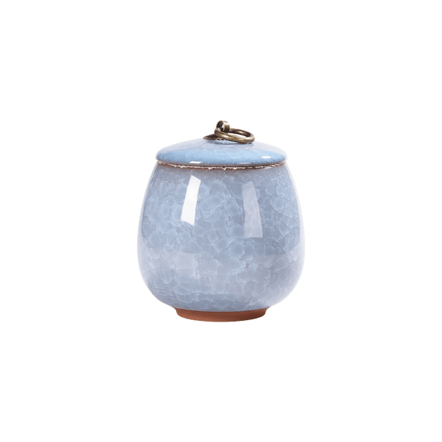 Celeste urn, hemelsblauwe keramische urn met craquelé-effect en bronzen ring op de deksel