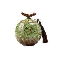 Keramische groene urn met bruine spikkels, ronde vorm, bruine kwast