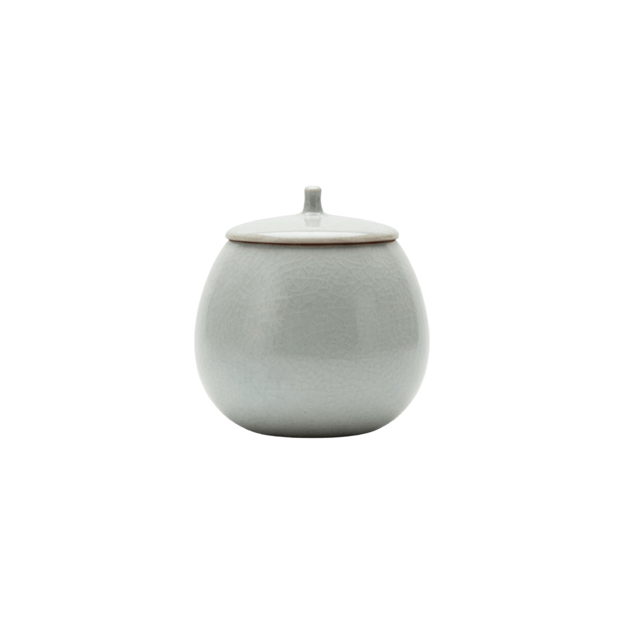 Ronde lichtgrijze keramische urn met deksel, craquelé glazuur
