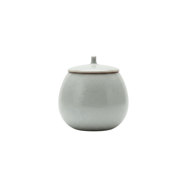Ronde lichtgrijze keramische urn met deksel, craquelé glazuur